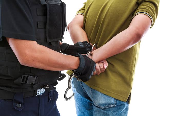 Guard de-escalating a situation
